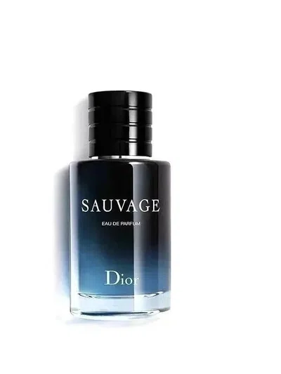 deep blue gradient cologne bottle with a black cap on a white ground