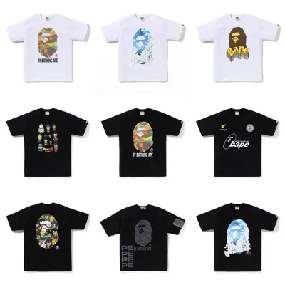 nine printed tees in black and white arranged in a three by three grid